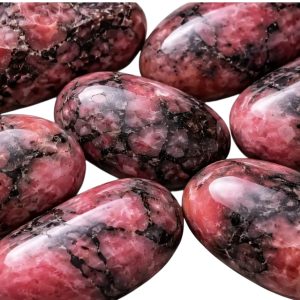Rhodonite - équilibre émotionnel dans les relations. Couleur vieux rose marbré noir